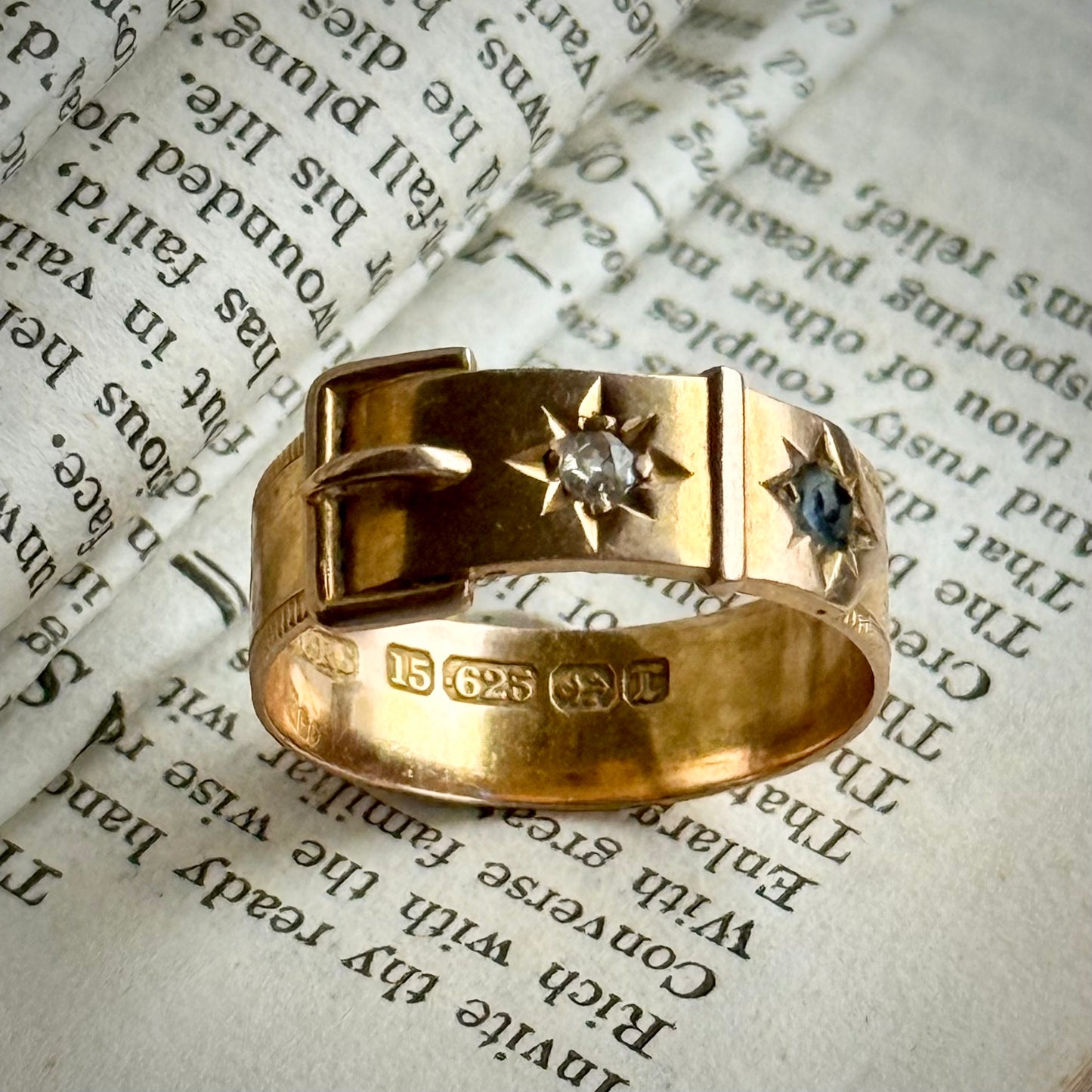 Victorian Buckle Diamond Ring in 15 Carat Gold; Circa 1891