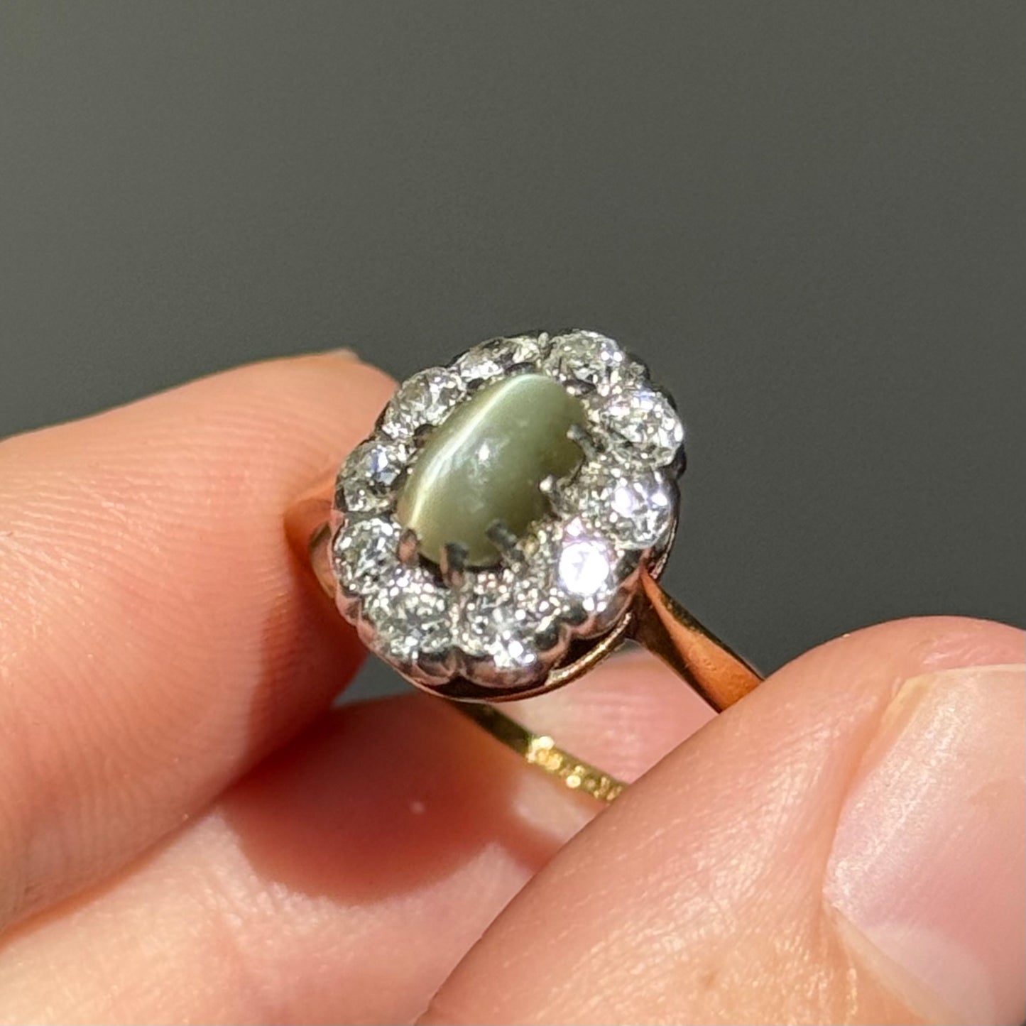 Antique Cat’s Eye Chrysoberyl & Diamond Halo Ring in 18 Carat Gold