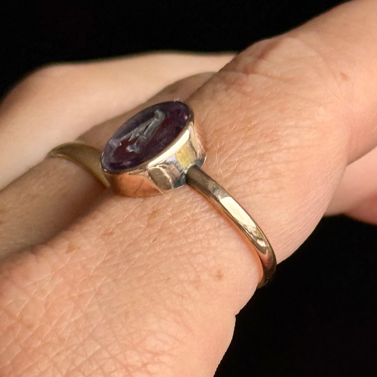 Antique Amethyst Intaglio 'A' Ring in 9 Carat Gold; Circa 1890