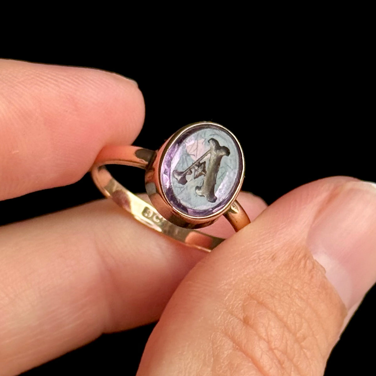 Antique Amethyst Intaglio 'A' Ring in 9 Carat Gold; Circa 1890
