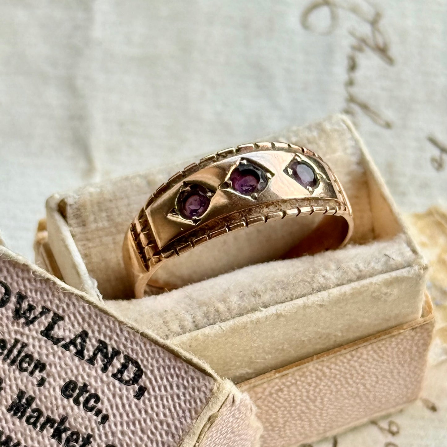 Victorian Amethyst Trilogy Ring in 9 Carat Gold; Circa 1896