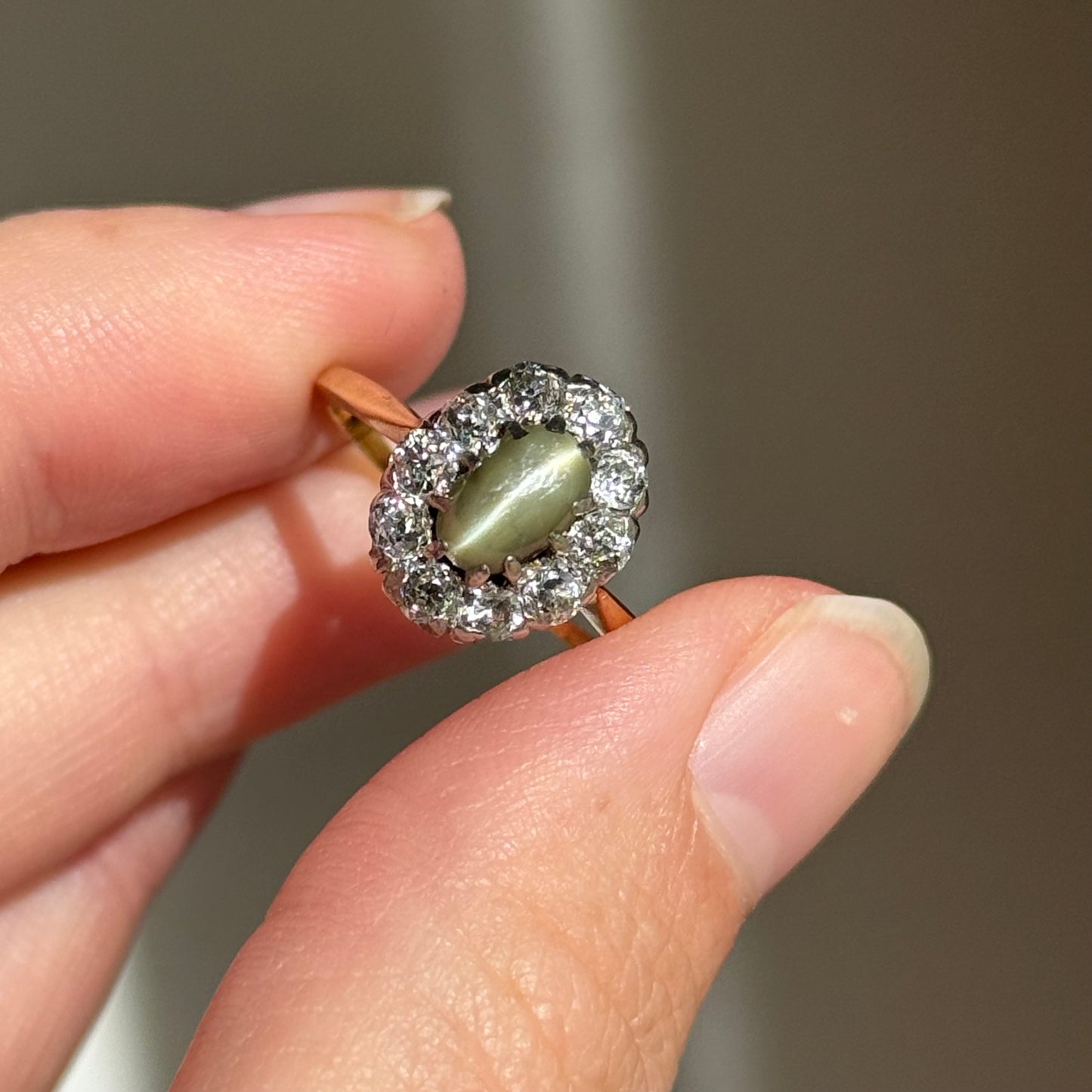 Antique Cat’s Eye Chrysoberyl & Diamond Halo Ring in 18 Carat Gold