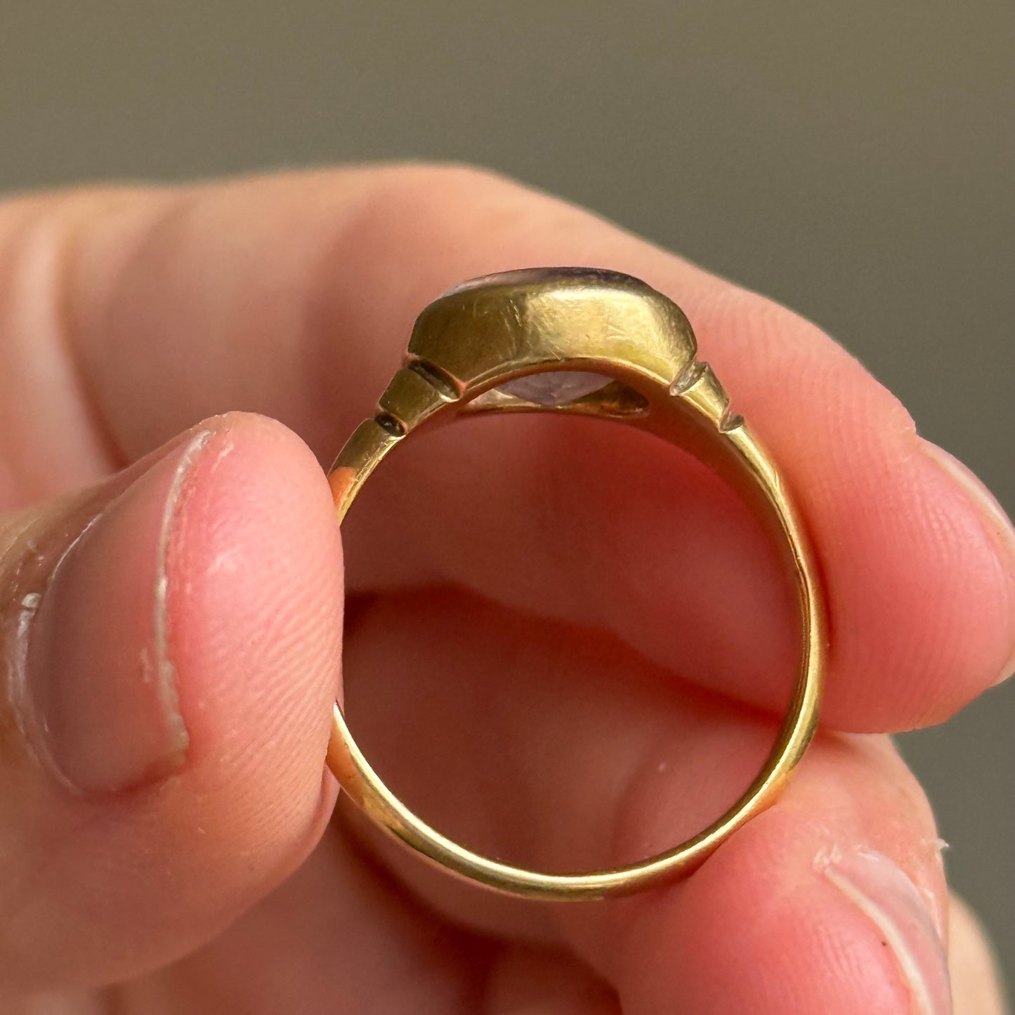 Antique Amethyst Intaglio Ring in 18 Carat Gold; Circa 1900