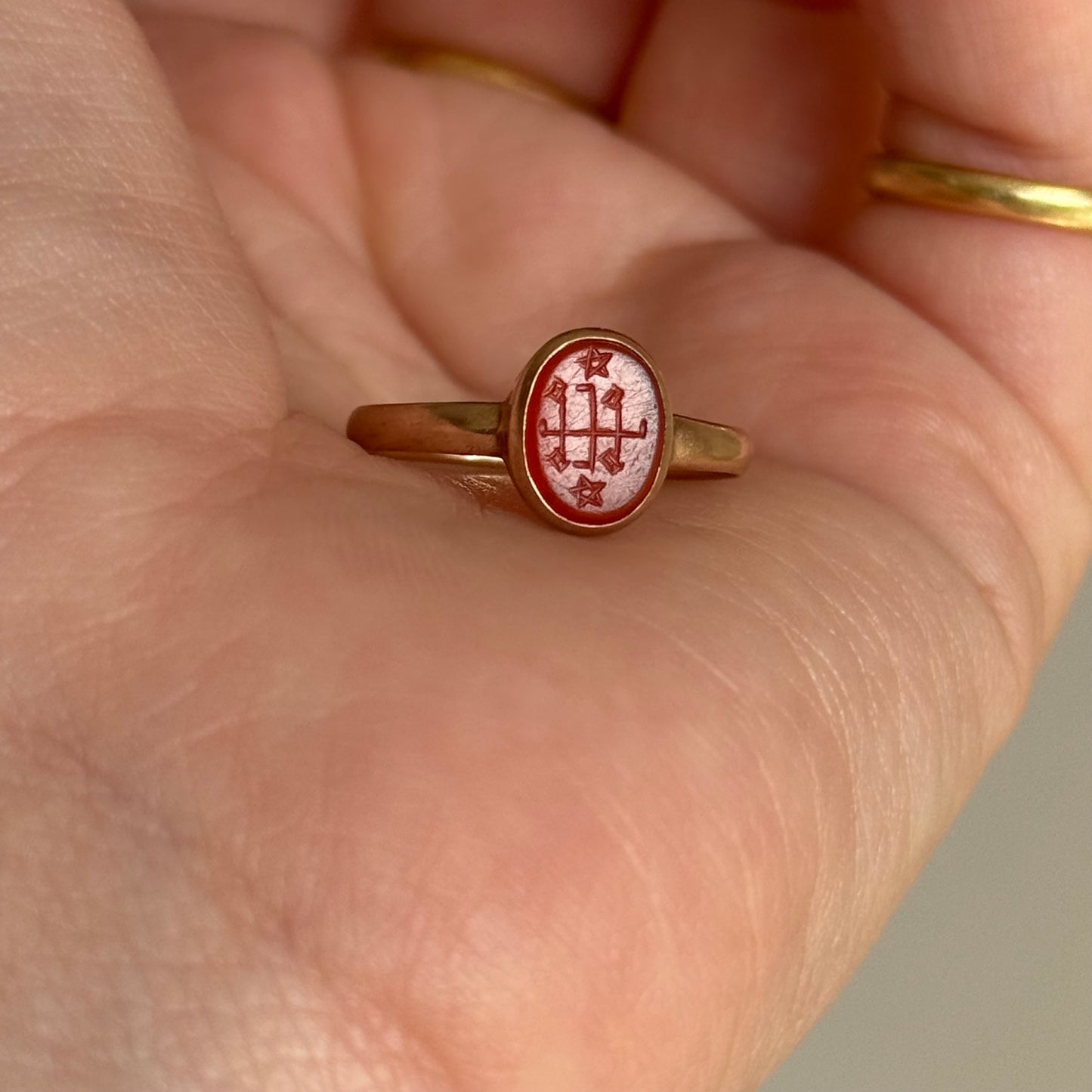 Edwardian Baha’i Ring Stone Ring in 9 Carat Rose Gold; Circa 1900