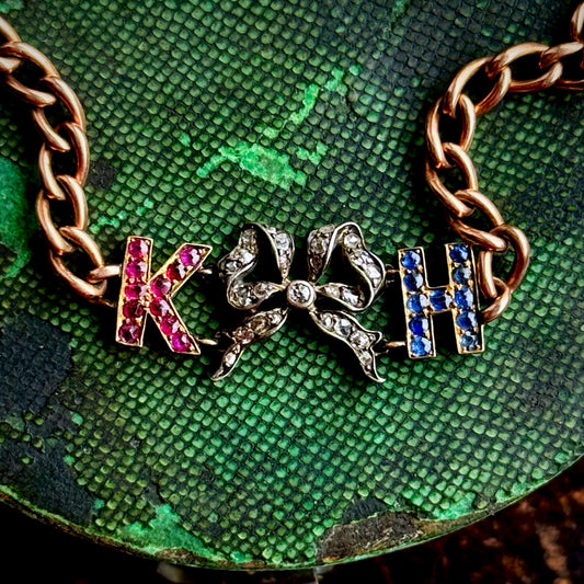 Antique 'K H' Diamond, Ruby & Sapphire Bracelet in 9 Carat Gold