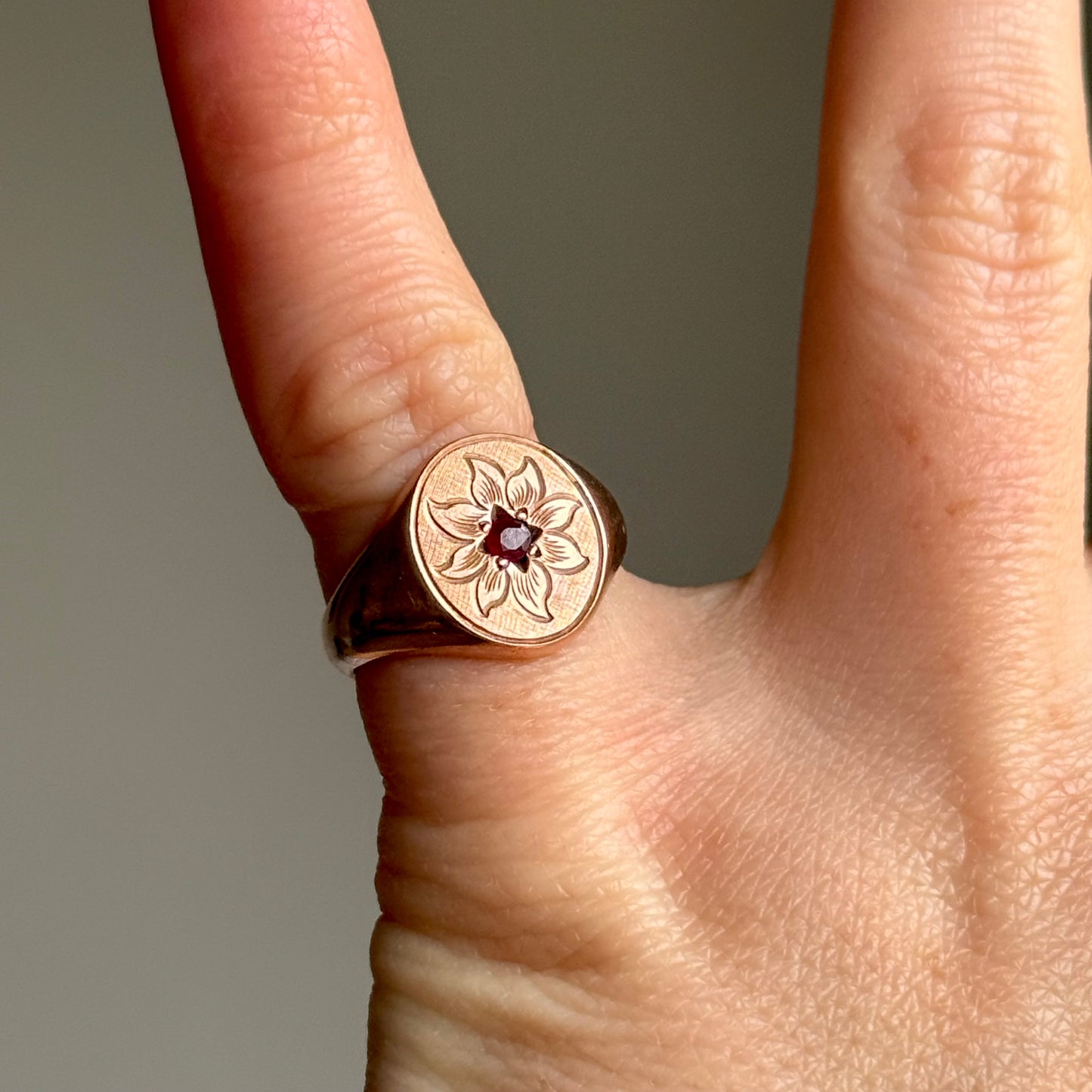 Antique Ruby Floral Signet Ring in 9 Carat Rose Gold; Circa 1919