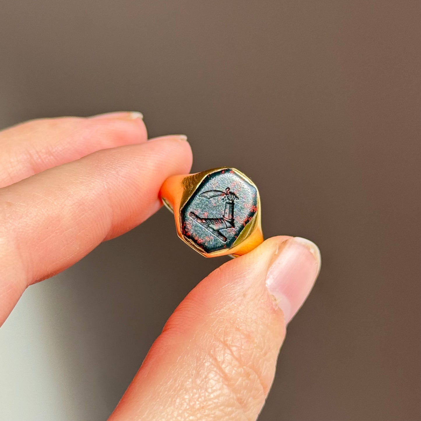 Antique Bloodstone Heraldic Signet Ring in 18 Carat Gold; Circa 1890