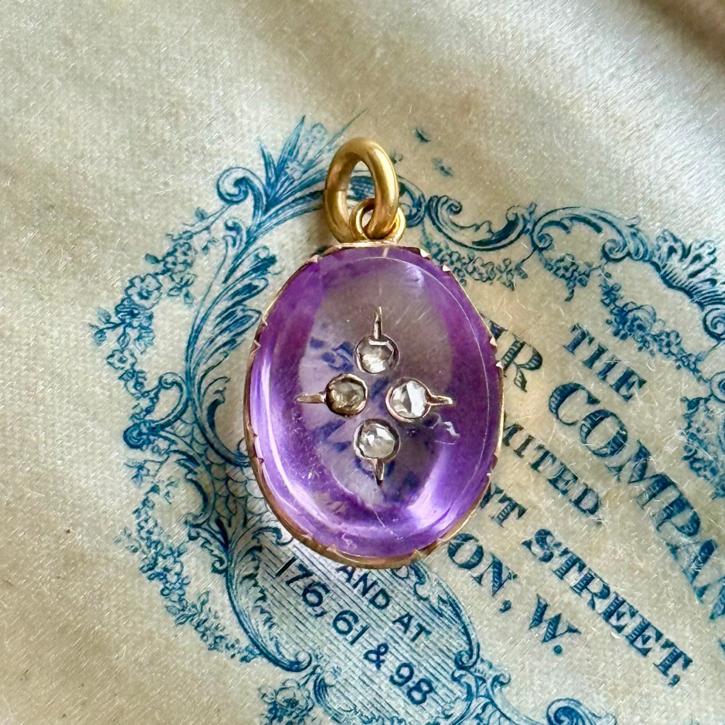 Victorian Amethyst Pendant with Floating Rose Cut Diamonds; Circa 1880
