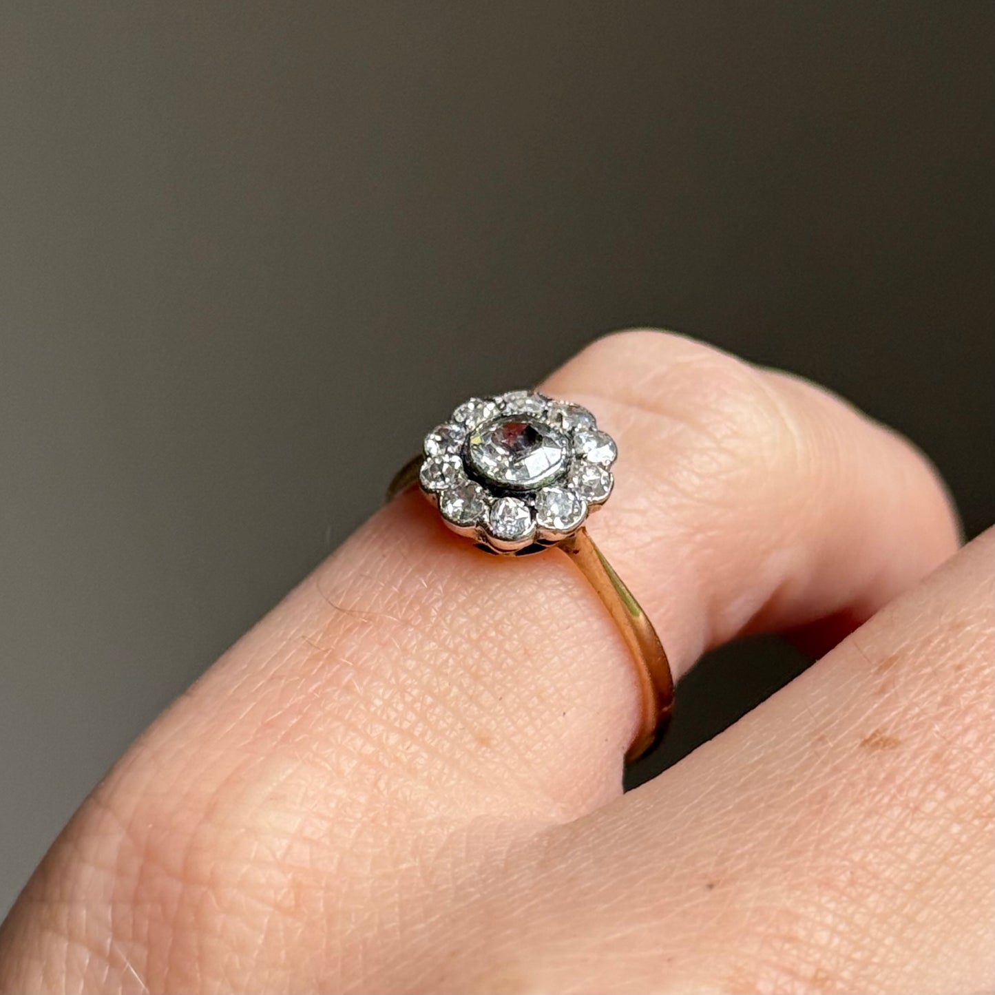 Edwardian Diamond Daisy Cluster Ring in 18 Carat Gold; Circa 1900