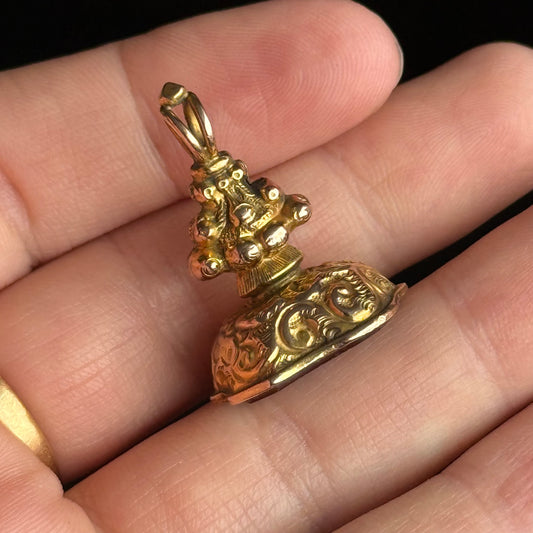 Antique 'Fuimus' Carnelian Fob Pendant in 9 Carat Gold; Circa 1907