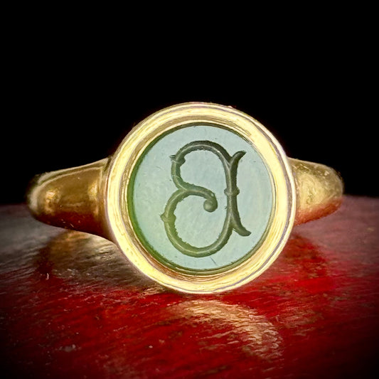 Antique Chalcedony 'B' Intaglio Ring in 18 Carat Gold; Circa 1880