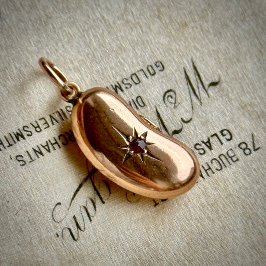 Victorian Lucky Ruby Kidney Bean Pendant 9 Carat Gold; Circa 1860