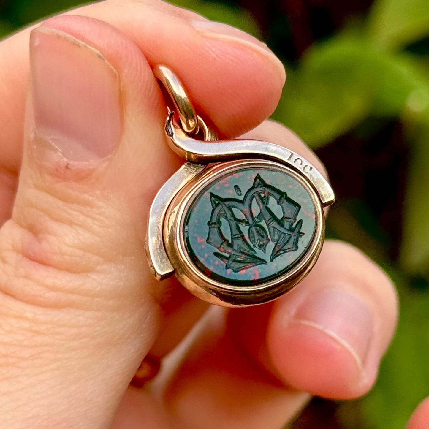 Antique Swivel Intaglio Dog  Pendant in 10 Carat Gold; Circa 1900