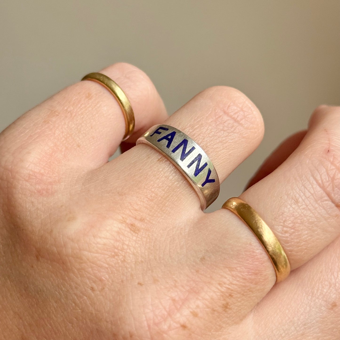Victorian 'Fanny' Enamel Ring In Silver; Circa 1879