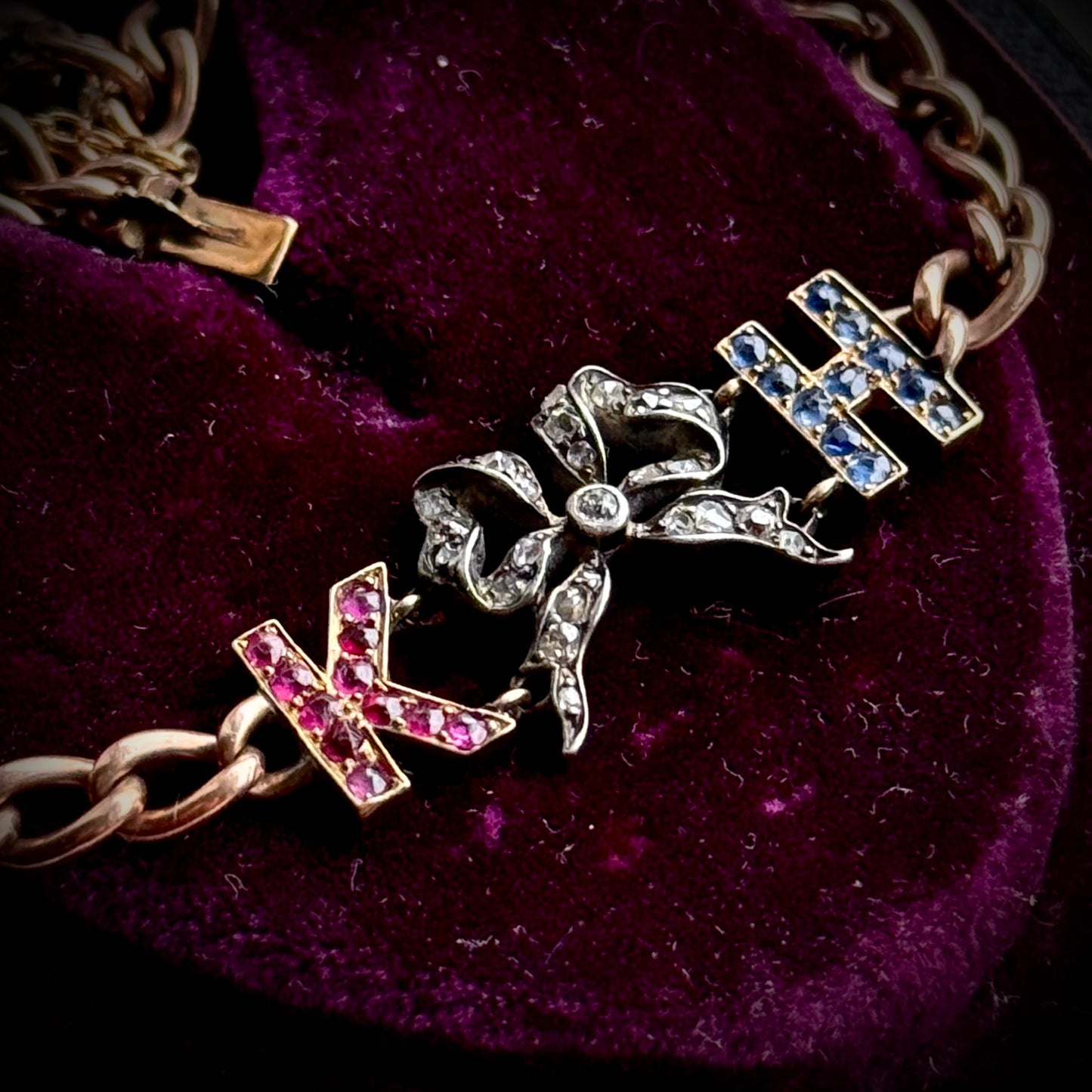 Antique 'K H' Diamond, Ruby & Sapphire Bracelet in 9 Carat Gold