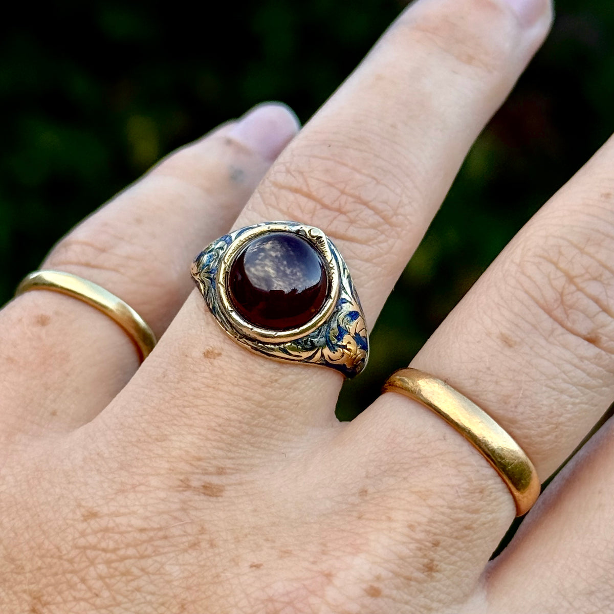 Antique Garnet Ouroboros Signet Ring in 9 Carat Gold; Circa 1870
