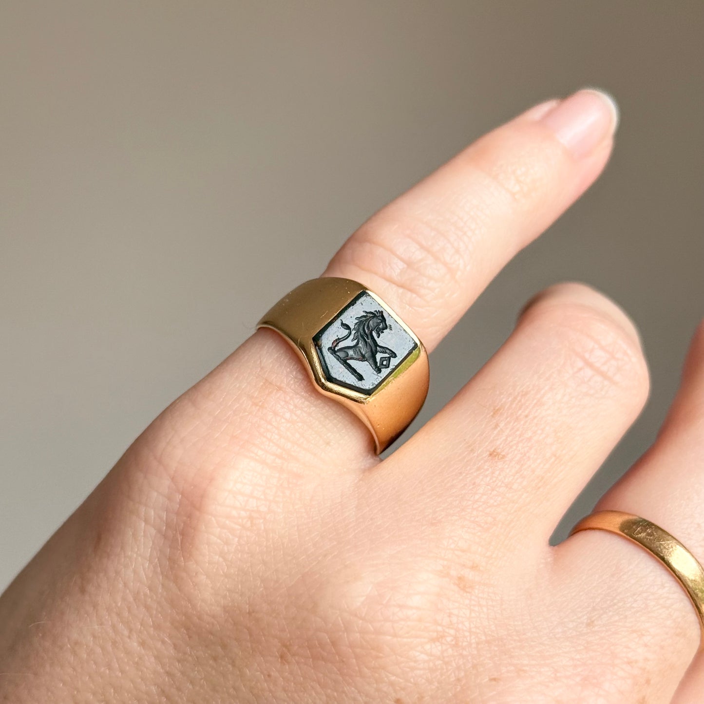 Antique Bloodstone Lion Signet Ring in 18 Carat Gold; Circa 1880