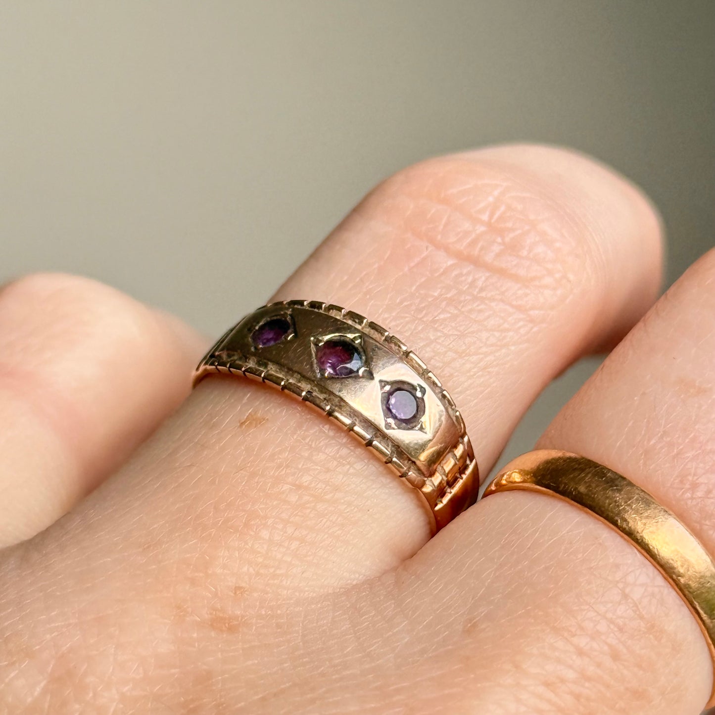Victorian Amethyst Trilogy Ring in 9 Carat Gold; Circa 1896