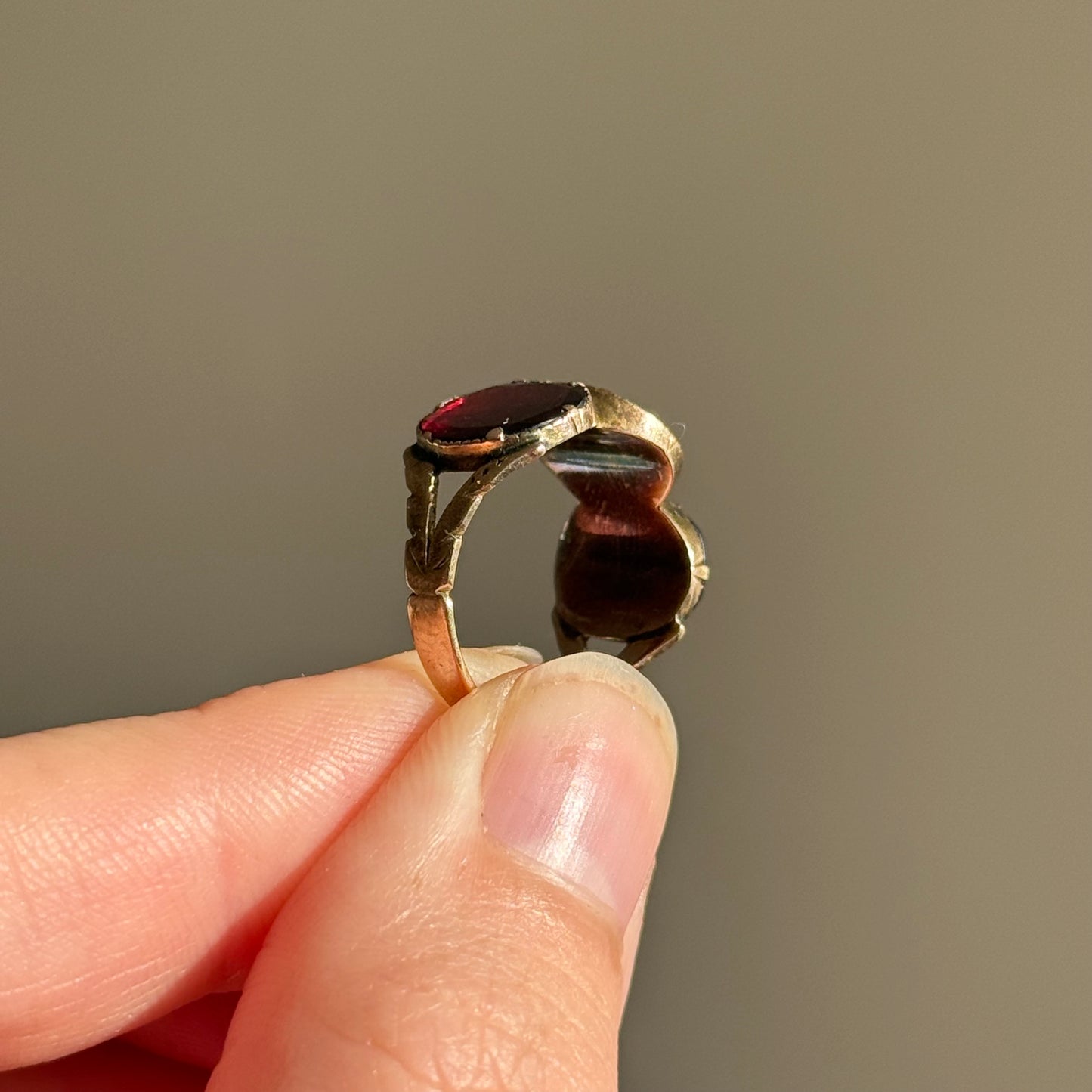 Georgian Foil Backed Garnet Ring in 15 Carat Gold, Circa 1830