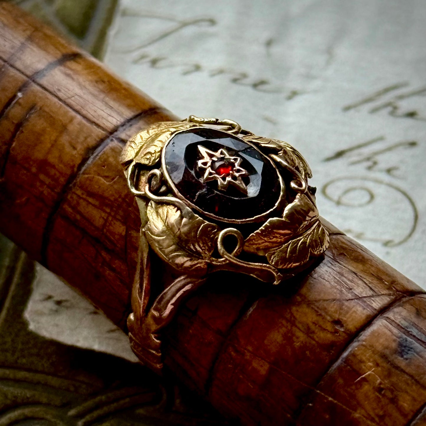 Antique Victorian Floral Garnet Ring in 9 Carat Gold; Circa 1880