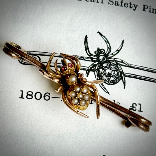 Victorian Spider Ruby and Pearl Brooch in 9 Carat Rose Gold; Circa 1890