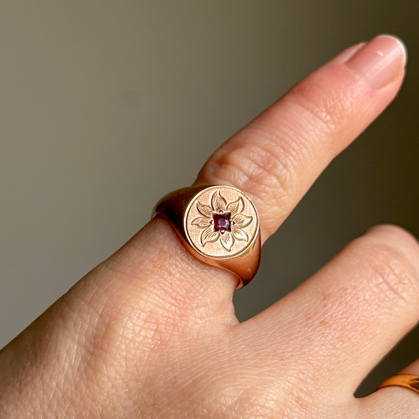 Antique Ruby Floral Signet Ring in 9 Carat Rose Gold; Circa 1919