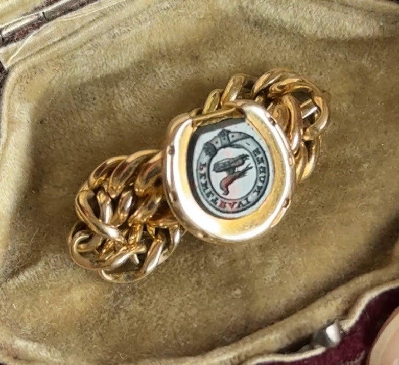 Antique Intaglio Horseshoe Chain ring in 18 Carat Gold; Circa 1880