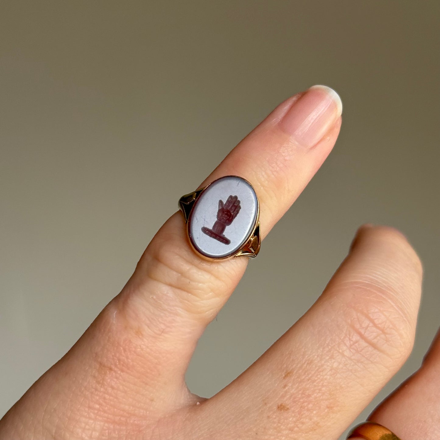 Tiny Sardonyx Hand Intaglio Ring in 9 Carat Gold; Circa 1980