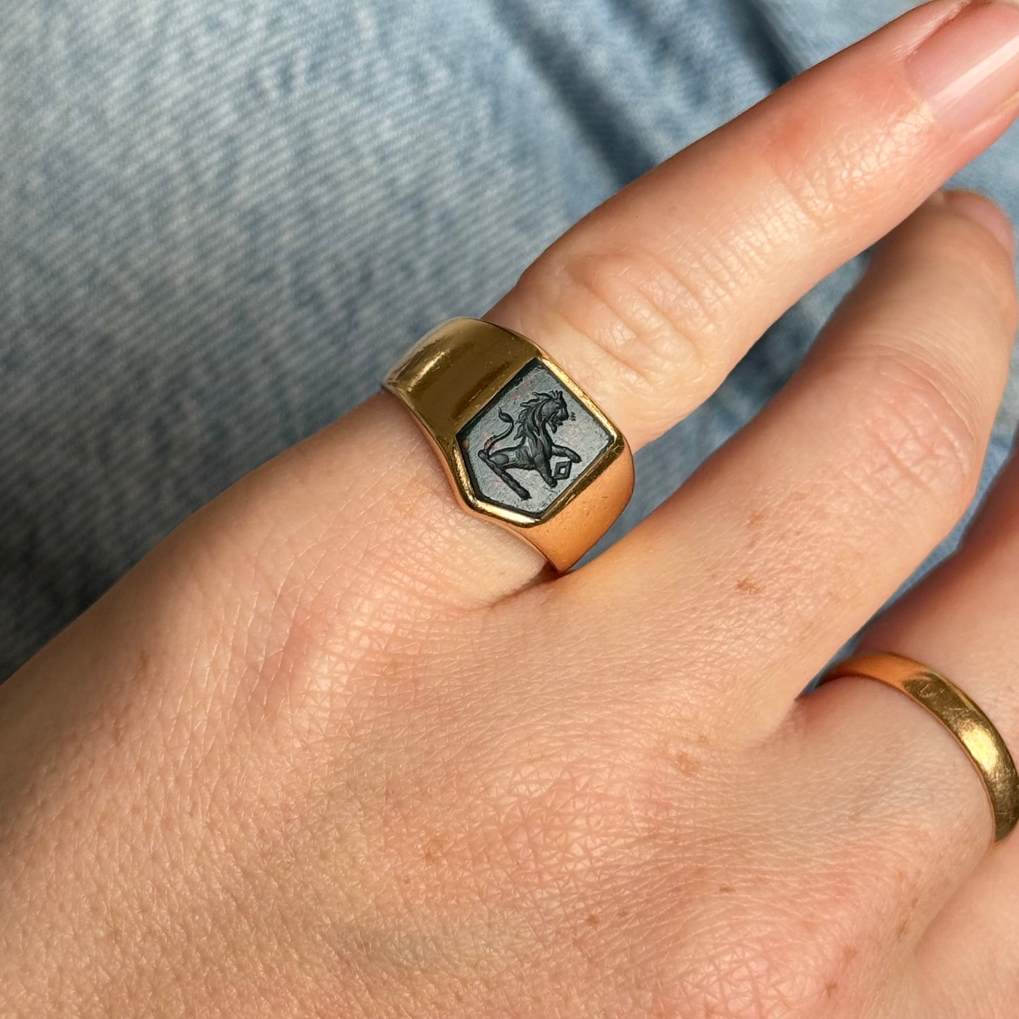 Antique Bloodstone Lion Signet Ring in 18 Carat Gold; Circa 1880