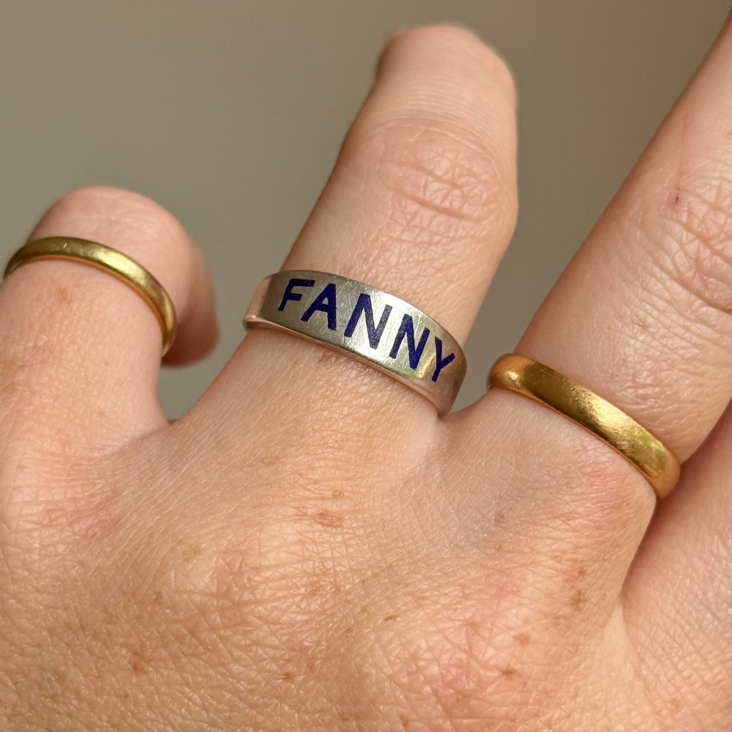 Victorian 'Fanny' Enamel Ring In Silver; Circa 1879