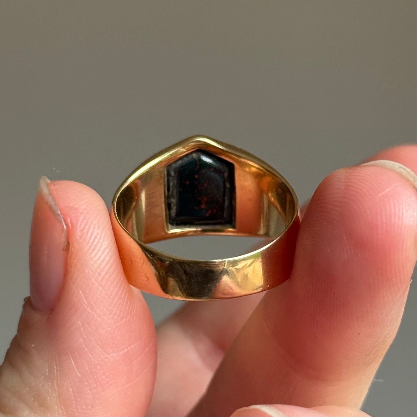Antique Bloodstone Lion Signet Ring in 18 Carat Gold; Circa 1880