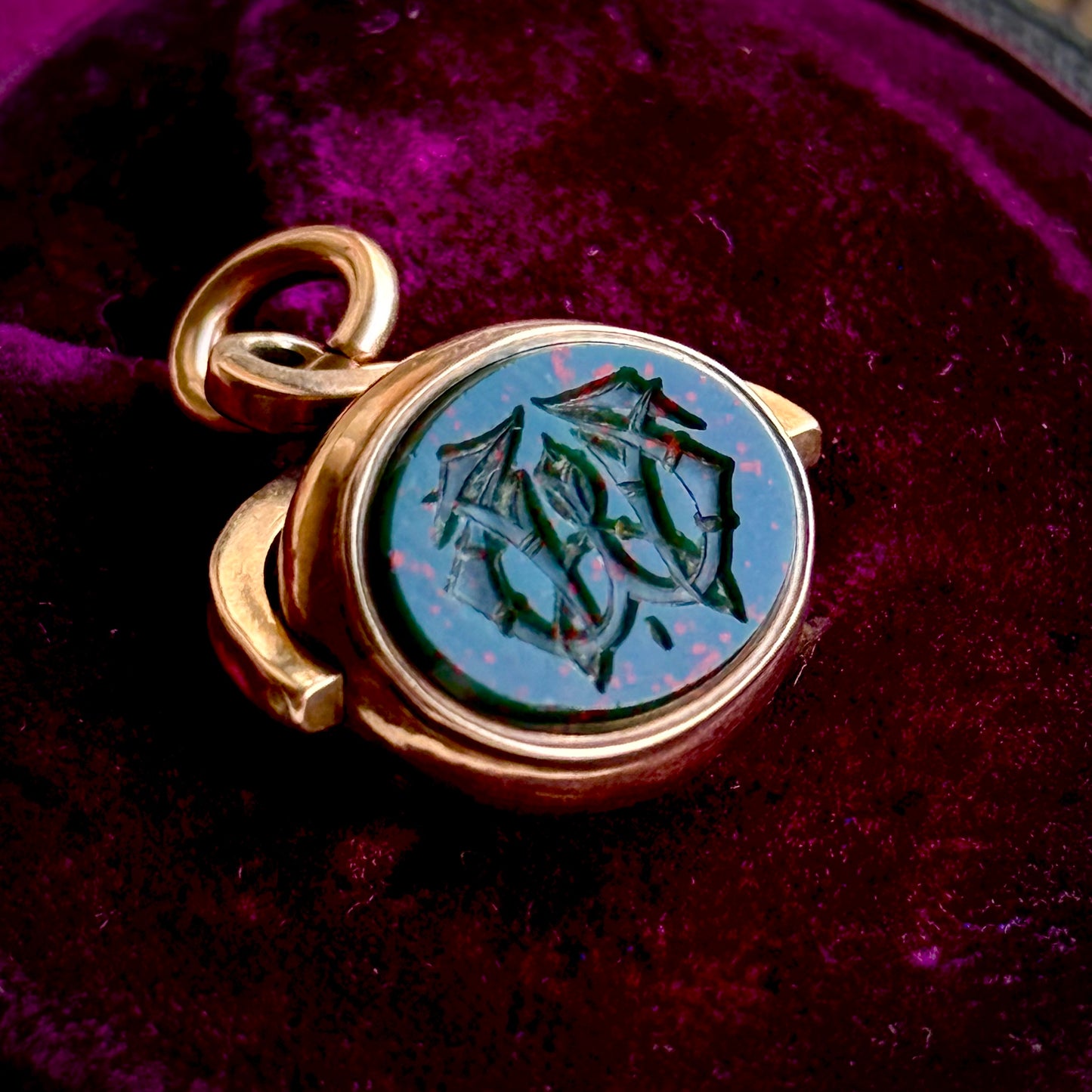 Antique Swivel Intaglio Dog  Pendant in 10 Carat Gold; Circa 1900