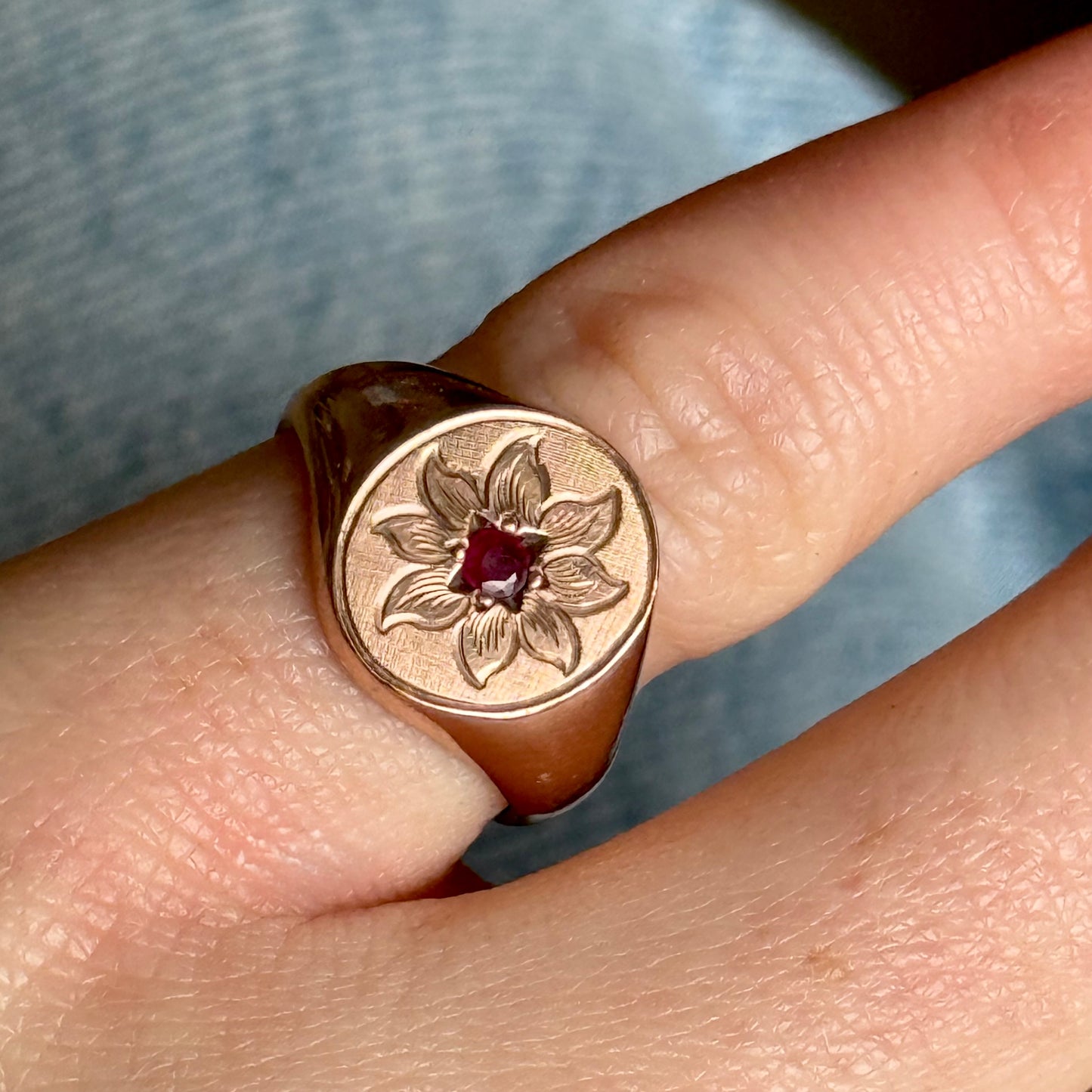 Antique Ruby Floral Signet Ring in 9 Carat Rose Gold; Circa 1919