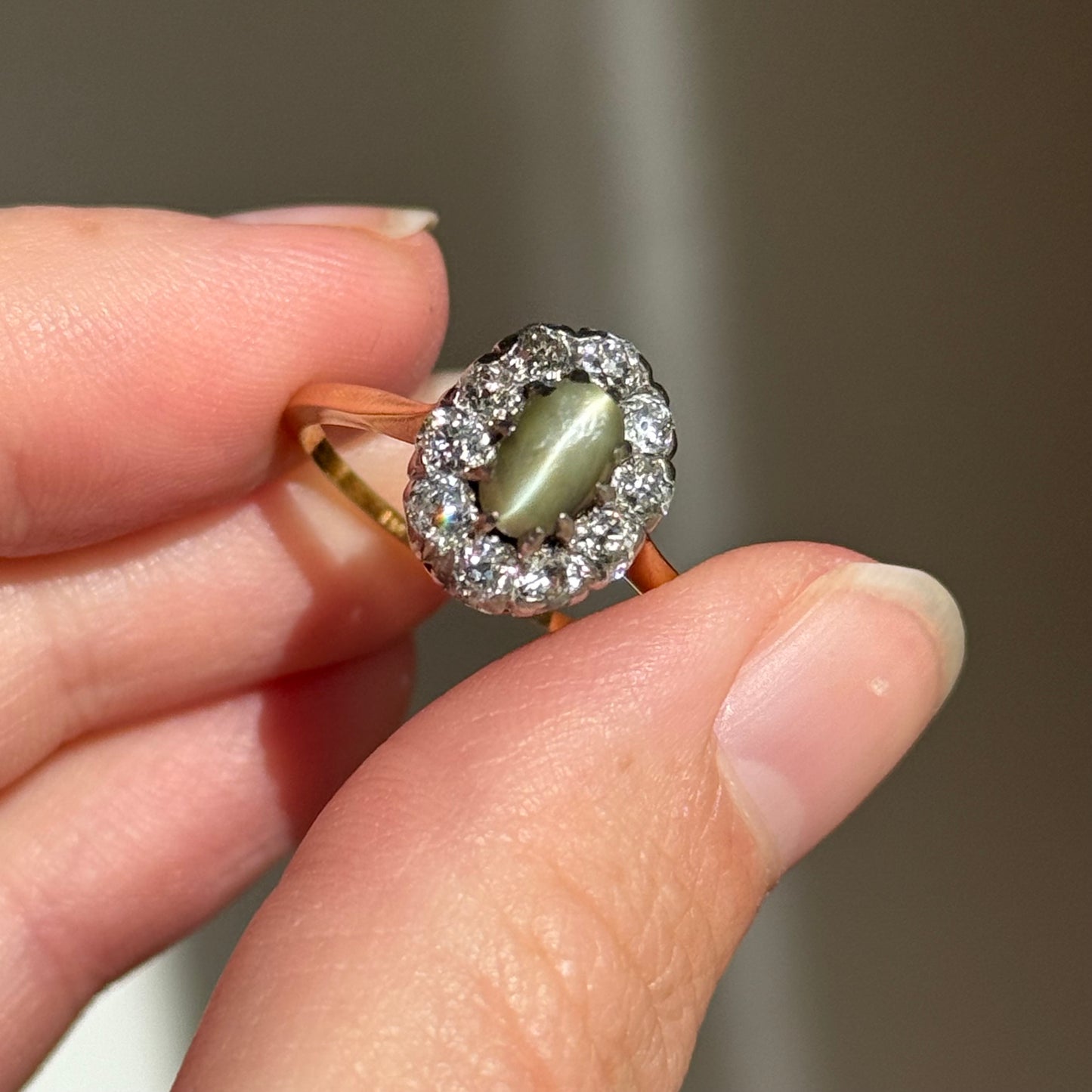 Antique Cat’s Eye Chrysoberyl & Diamond Halo Ring in 18 Carat Gold