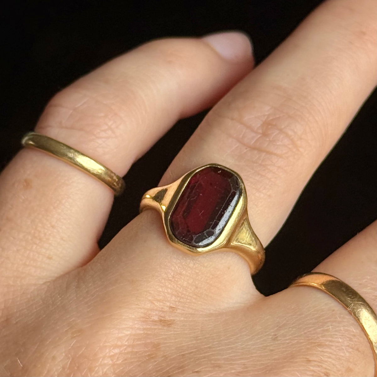 Antique Garnet Signet Ring in 18 Carat Gold; Circa 1919