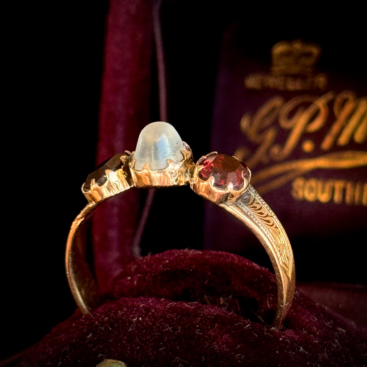 Moonstone & Garnet Ring in 15 Carat gold; Circa 1880