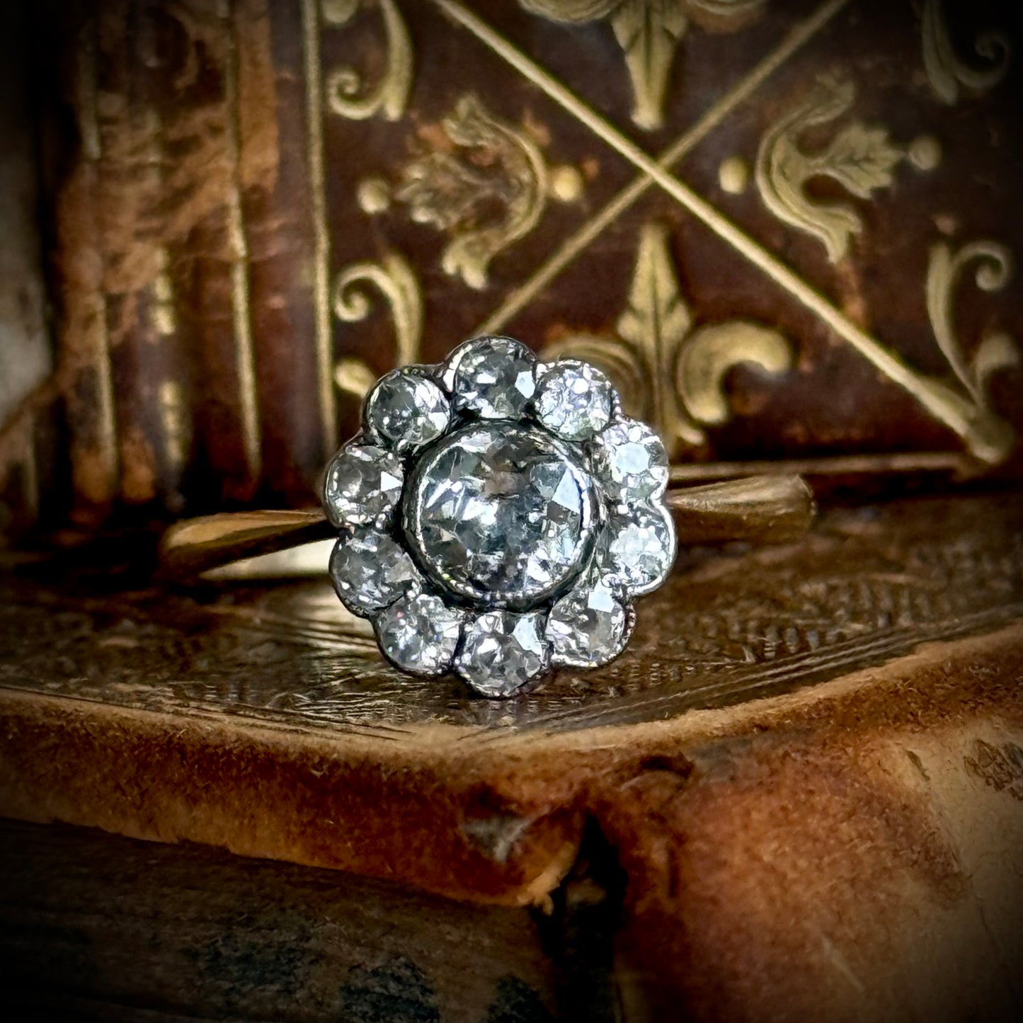 Edwardian Diamond Daisy Cluster Ring in 18 Carat Gold; Circa 1900