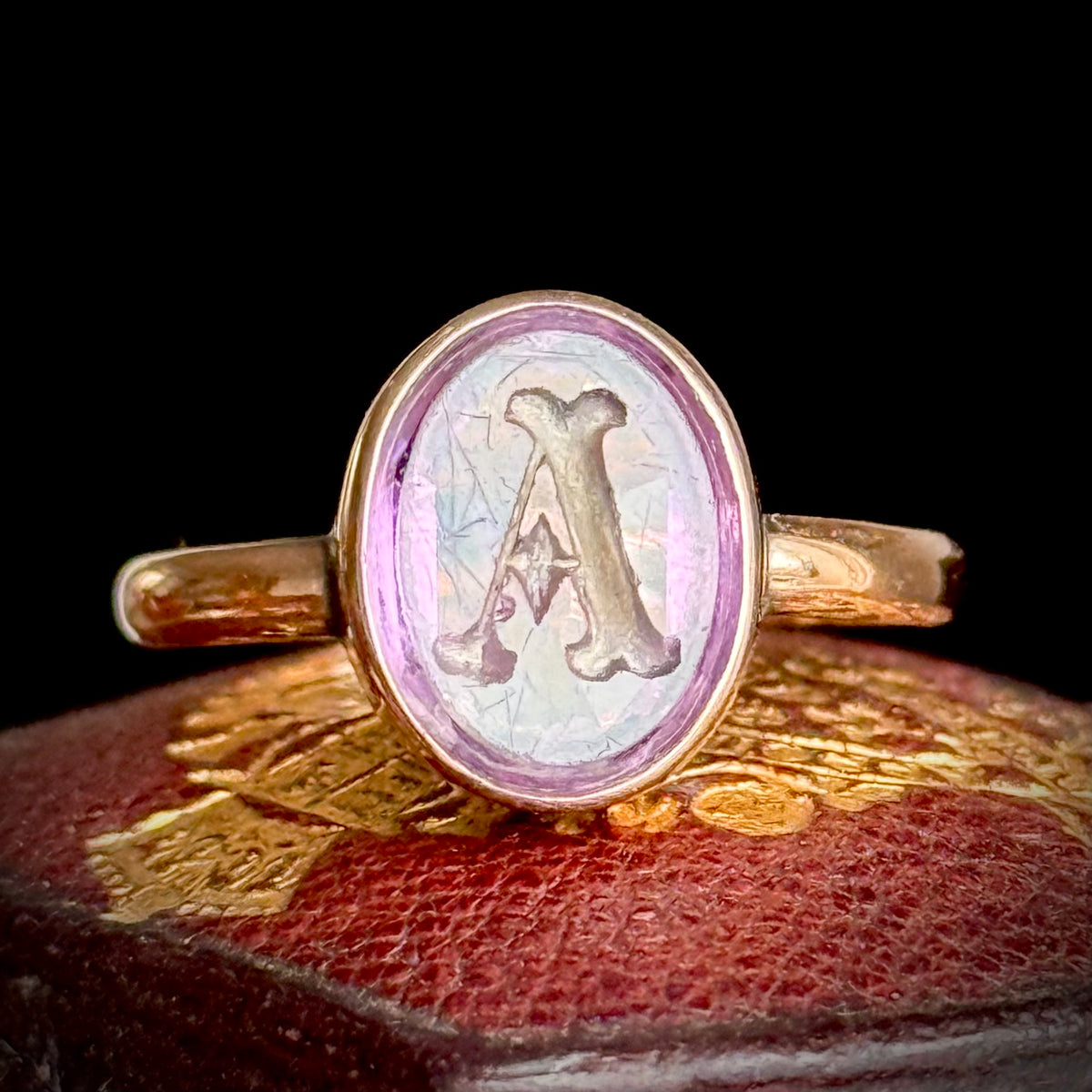 Antique Amethyst Intaglio 'A' Ring in 9 Carat Gold; Circa 1890