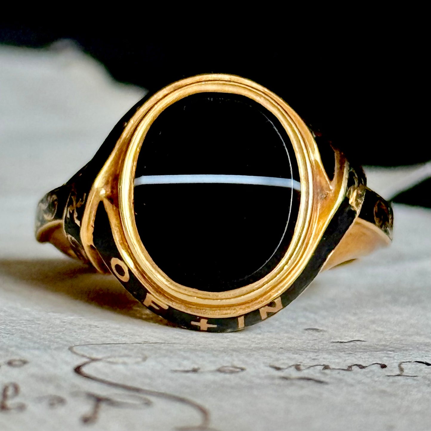 Early Victorian Agate & Enamel Mourning Ring in 18 Carat Gold; Circa 1849
