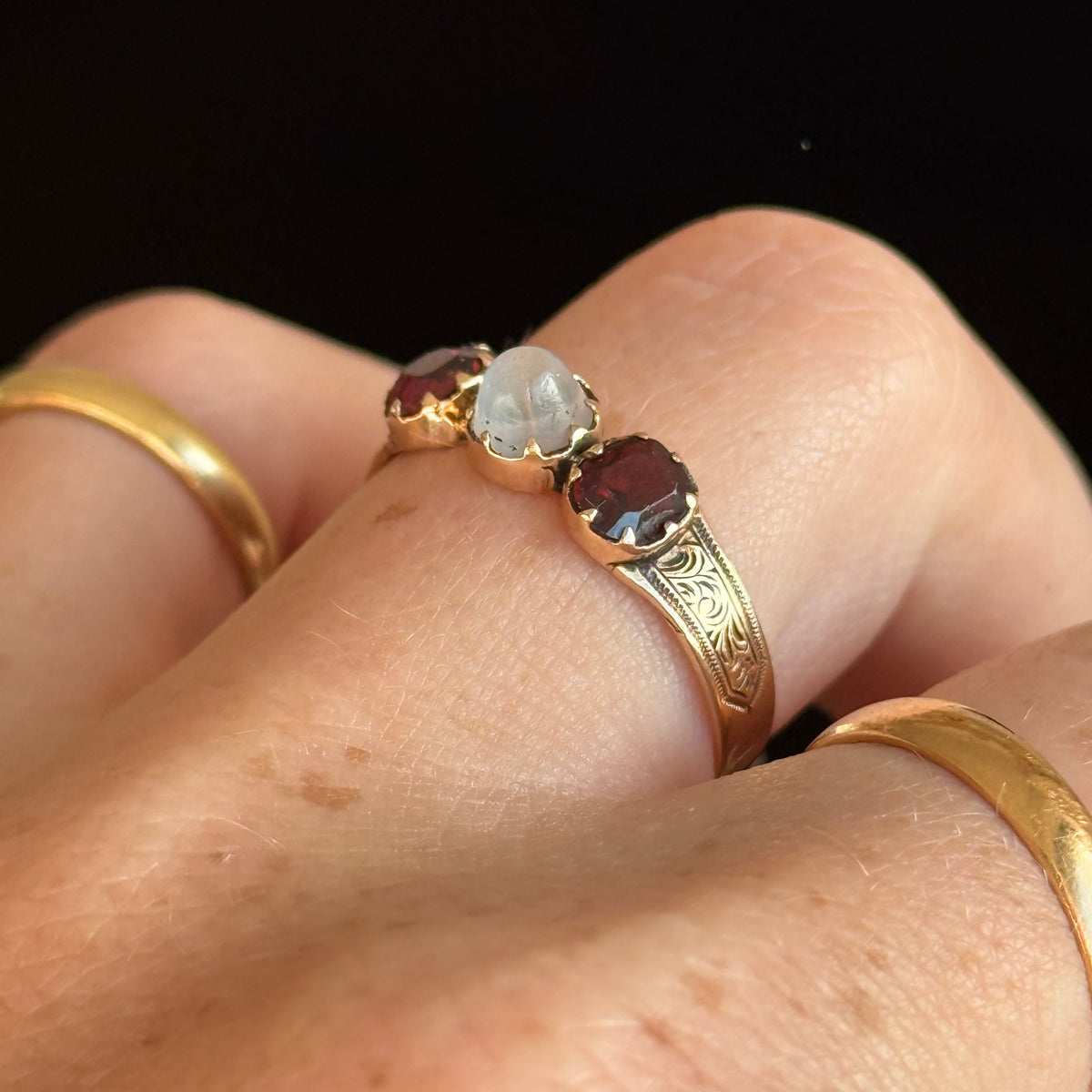 Moonstone & Garnet Ring in 15 Carat gold; Circa 1880