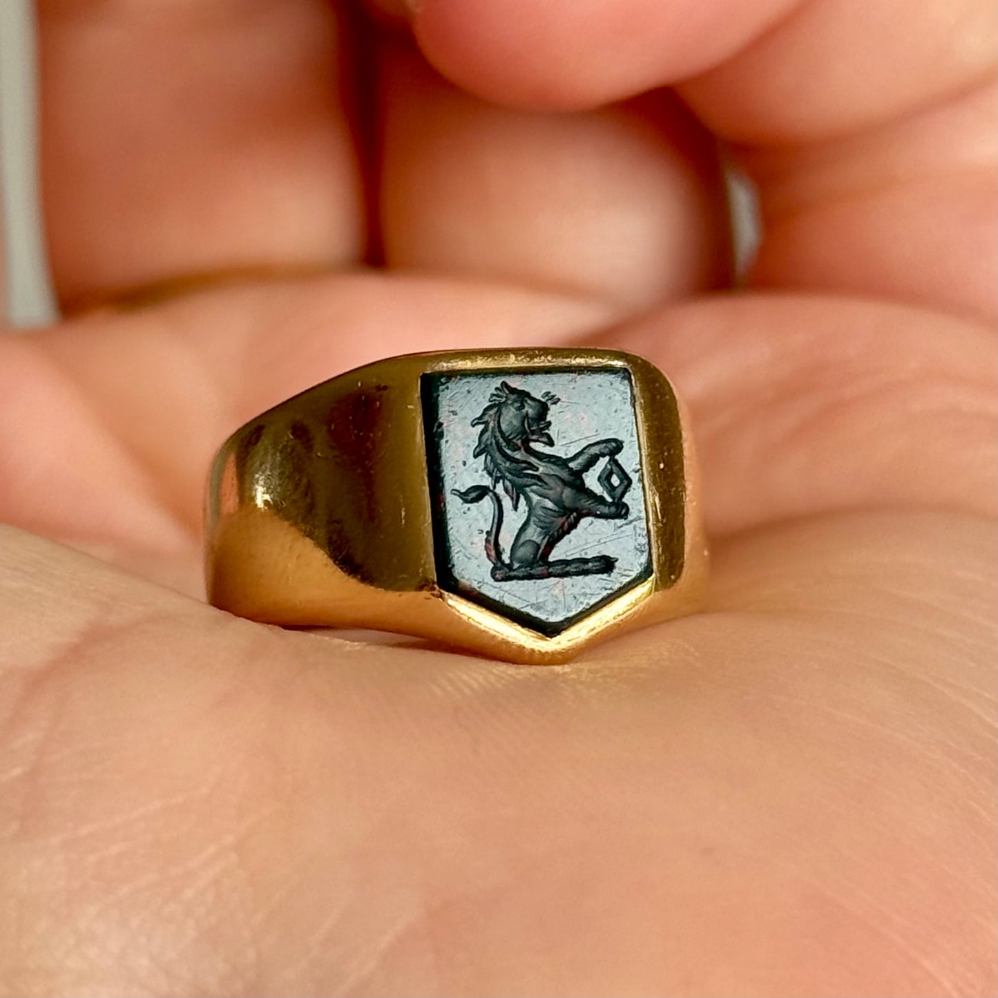 Antique Bloodstone Lion Signet Ring in 18 Carat Gold; Circa 1880