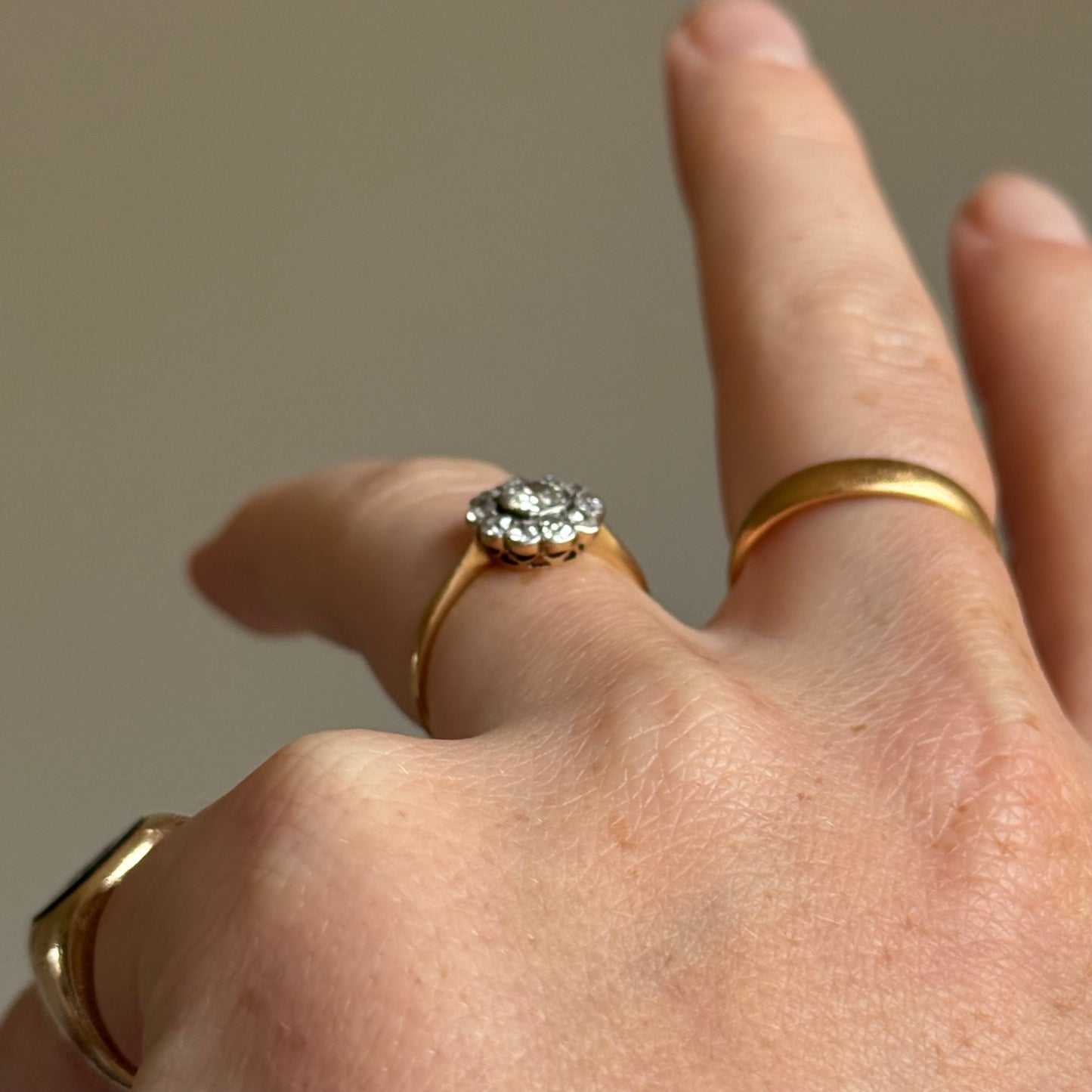 Edwardian Diamond Daisy Cluster Ring in 18 Carat Gold; Circa 1900