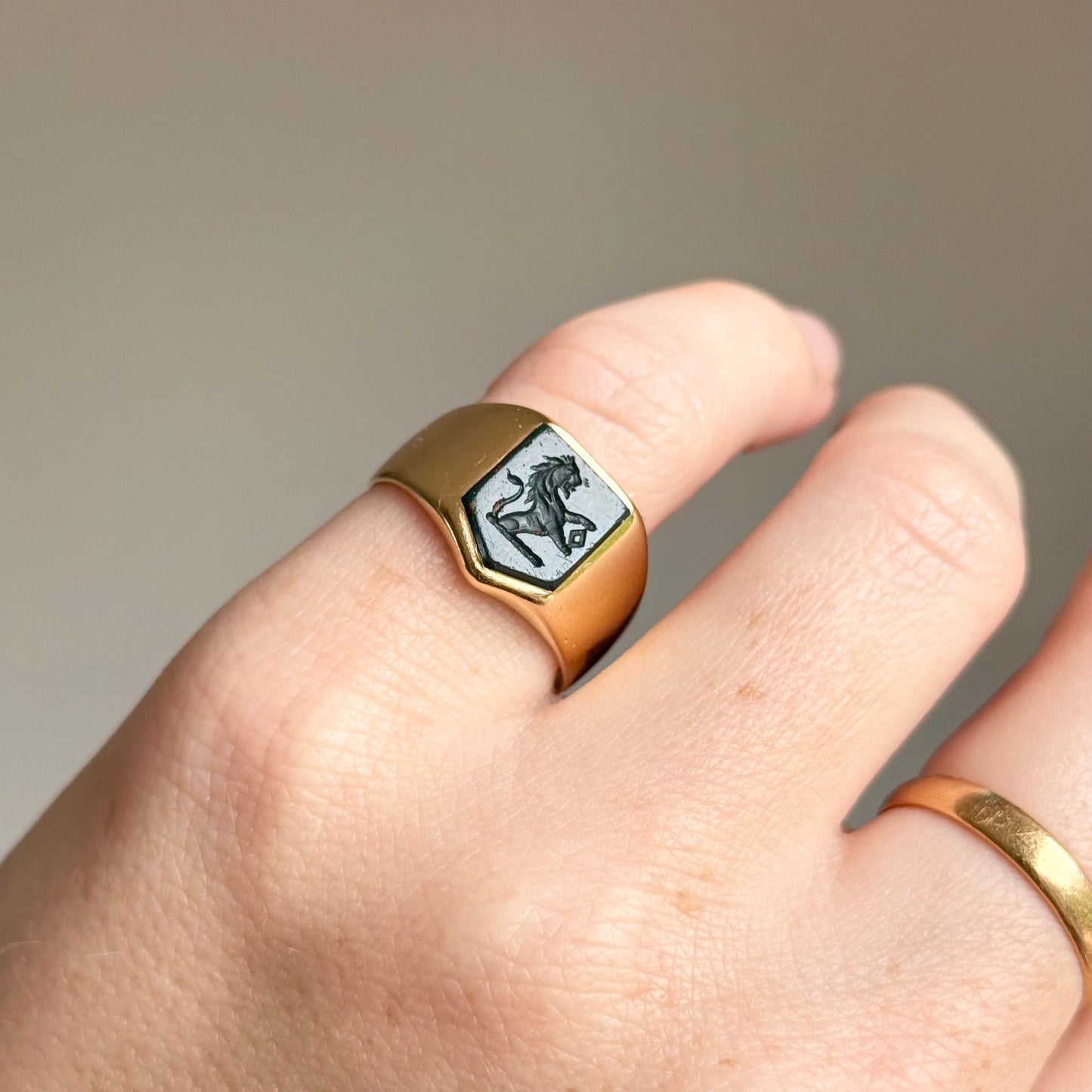 Antique Bloodstone Lion Signet Ring in 18 Carat Gold; Circa 1880