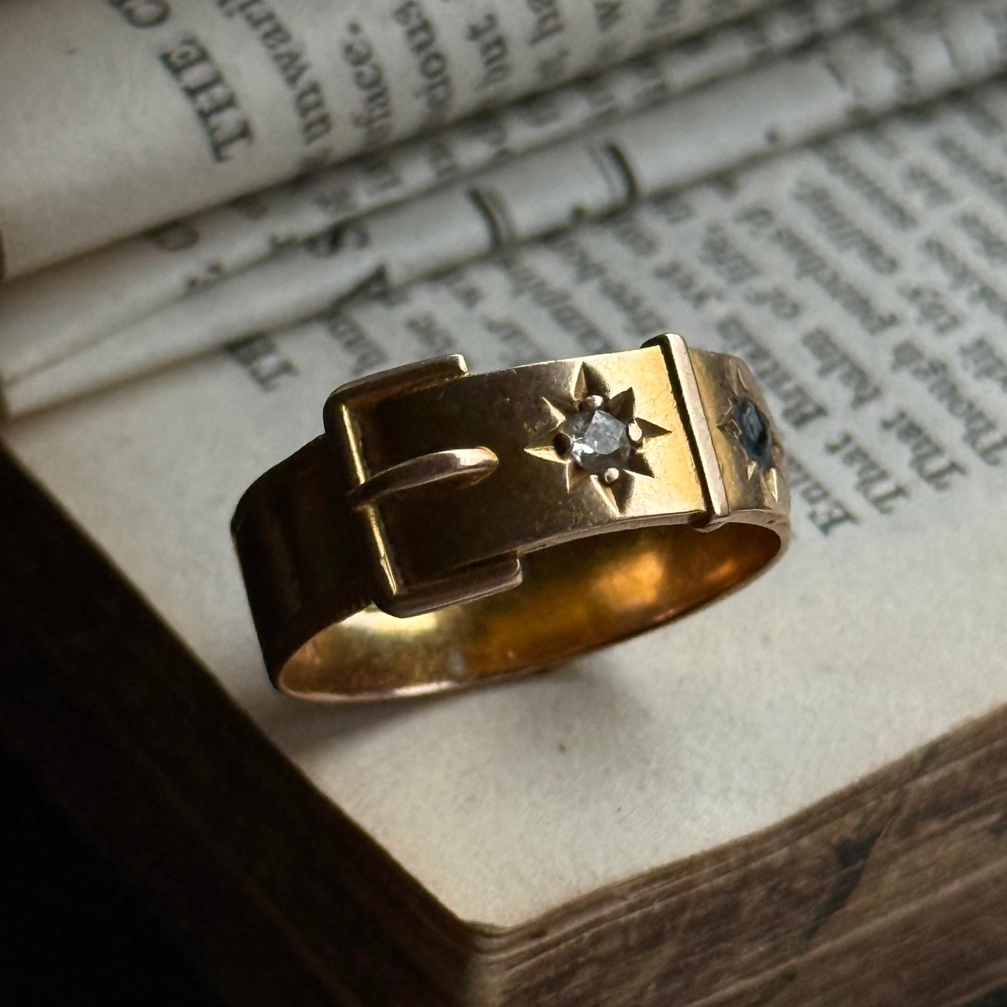 Victorian Buckle Diamond Ring in 15 Carat Gold; Circa 1891