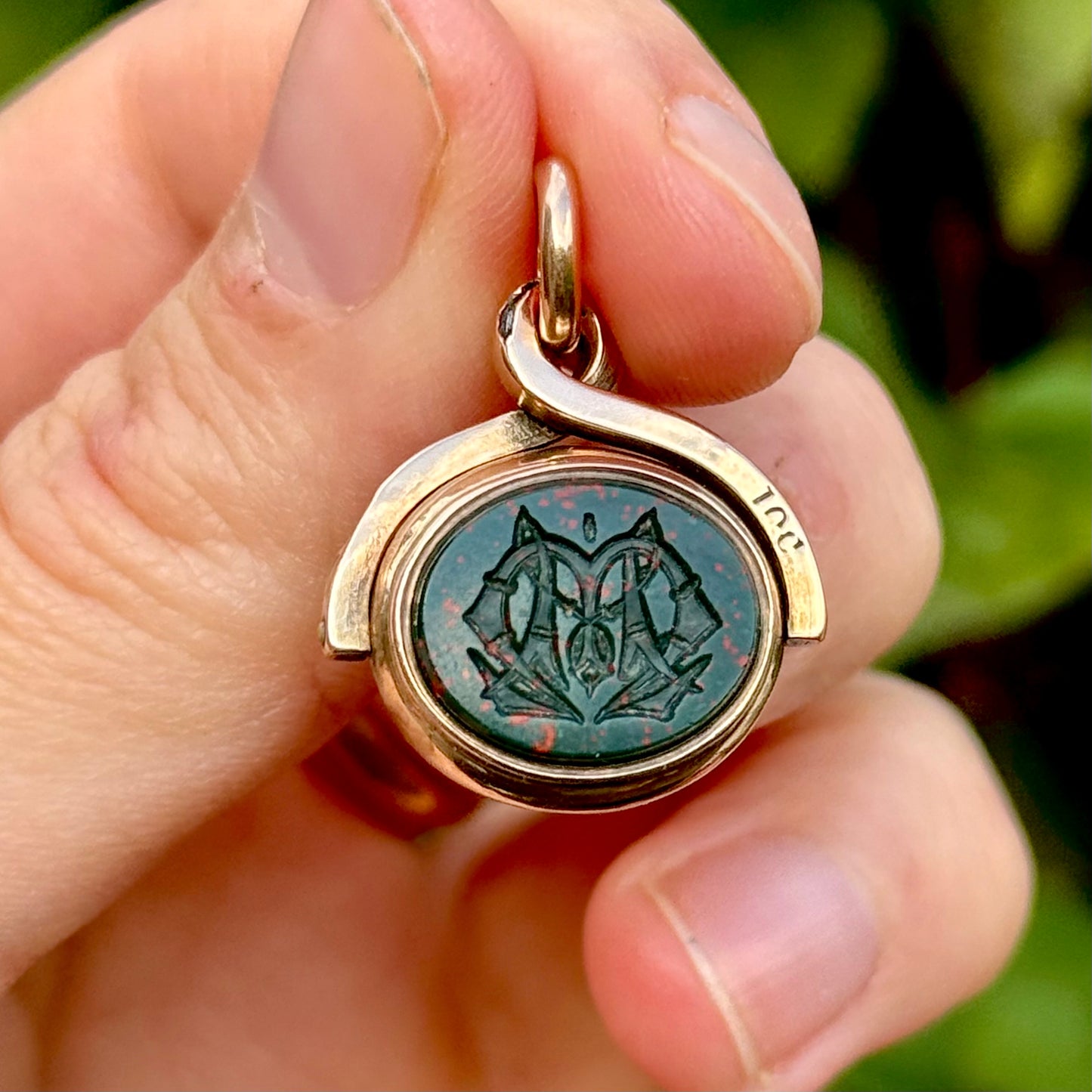 Antique Swivel Intaglio Dog  Pendant in 10 Carat Gold; Circa 1900