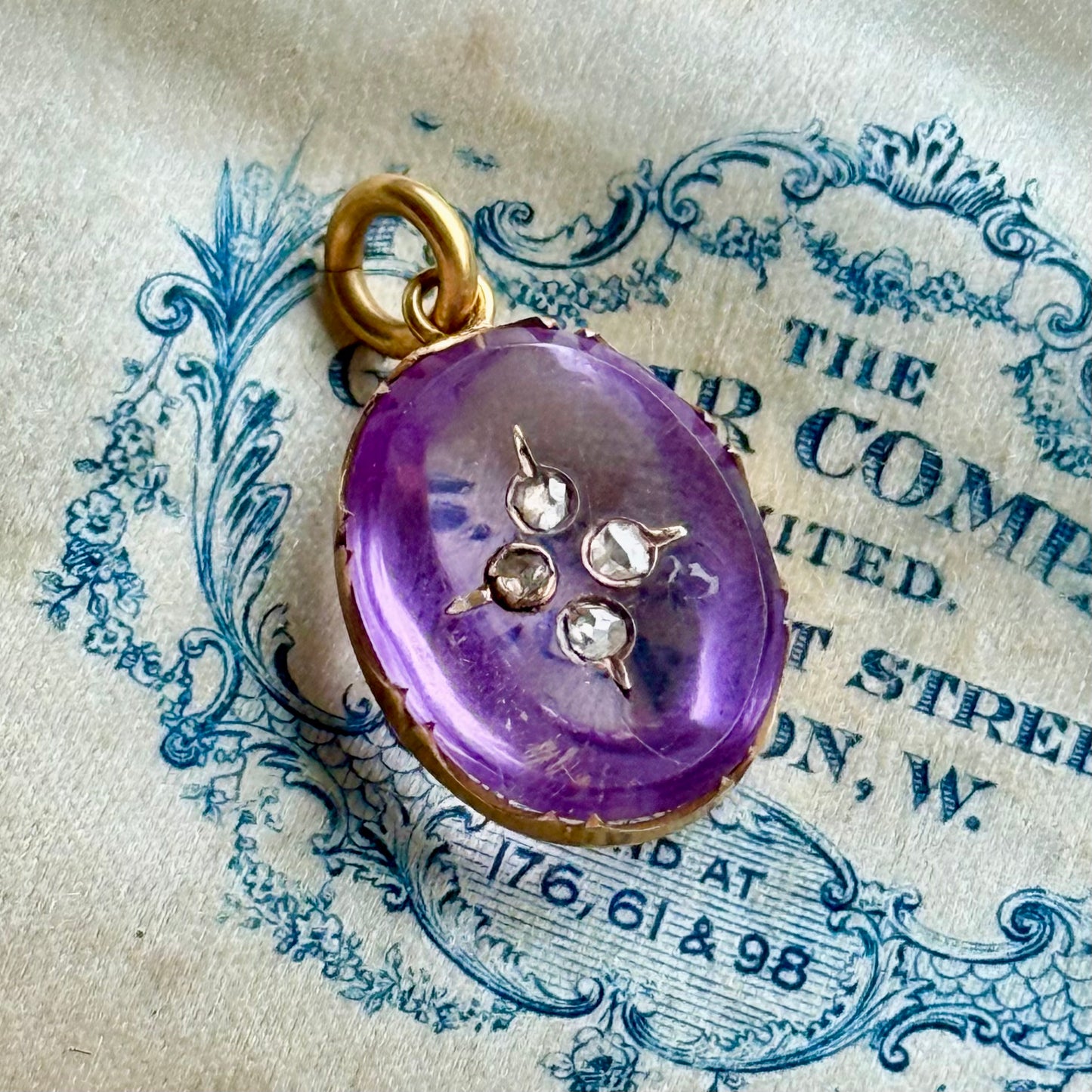 Victorian Amethyst Pendant with Floating Rose Cut Diamonds; Circa 1880