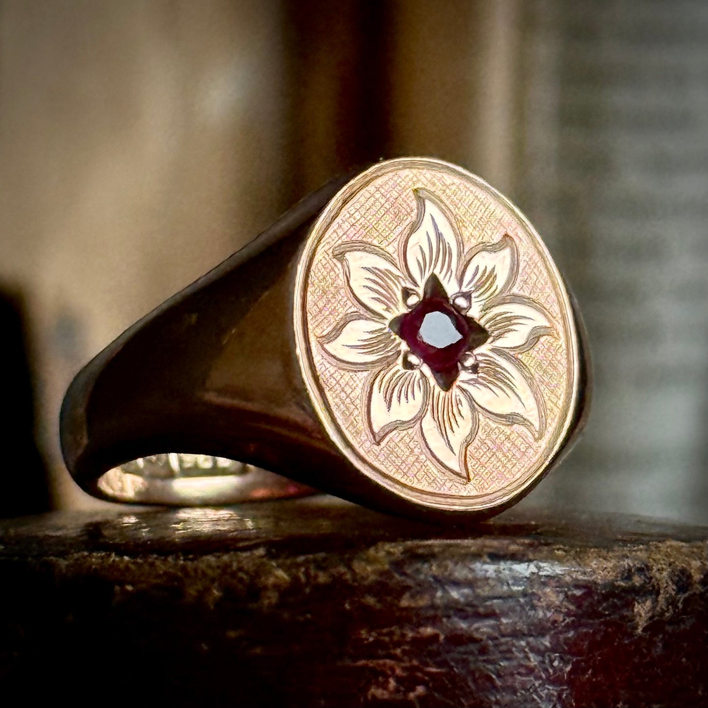 Antique Ruby Floral Signet Ring in 9 Carat Rose Gold; Circa 1919