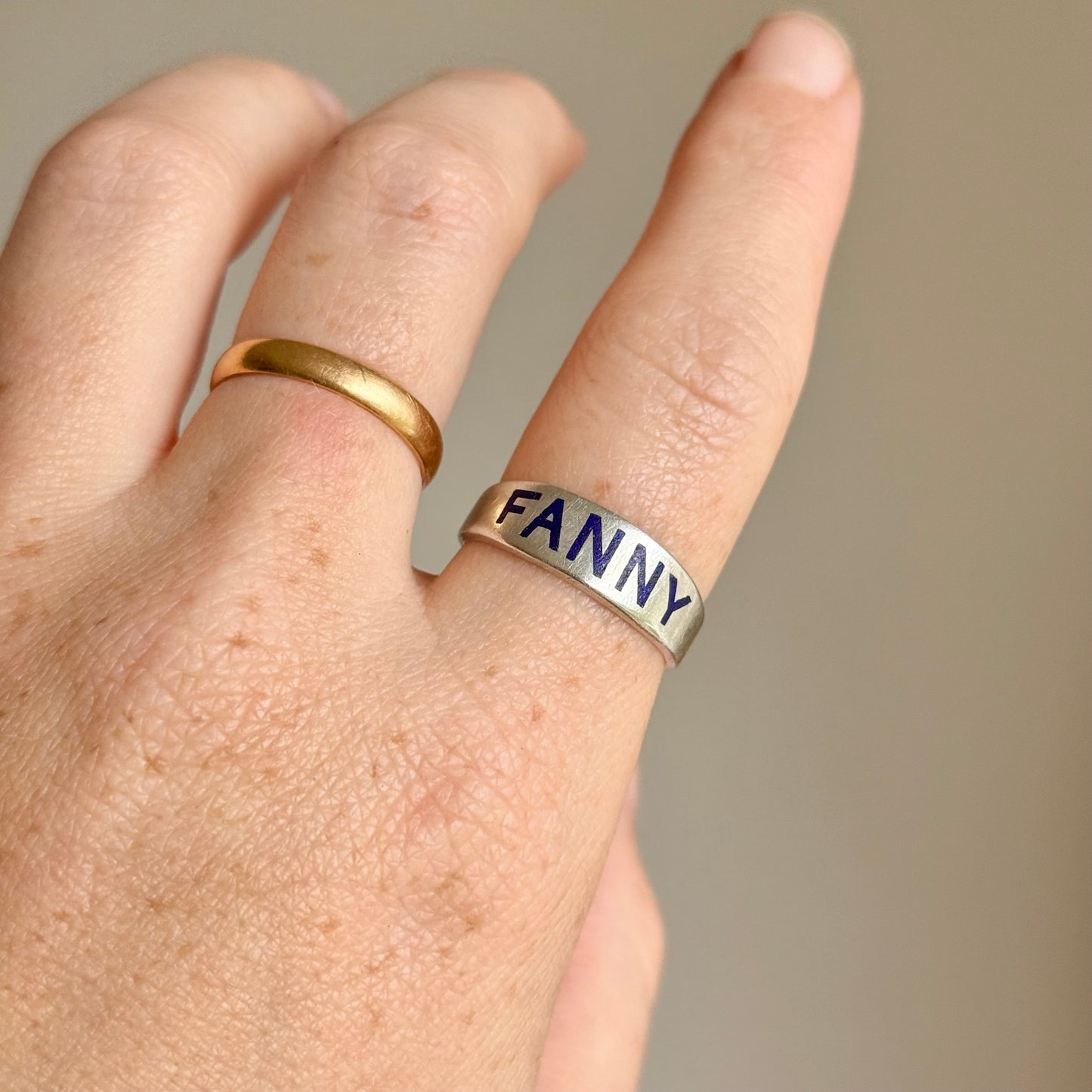 Victorian 'Fanny' Enamel Ring In Silver; Circa 1879