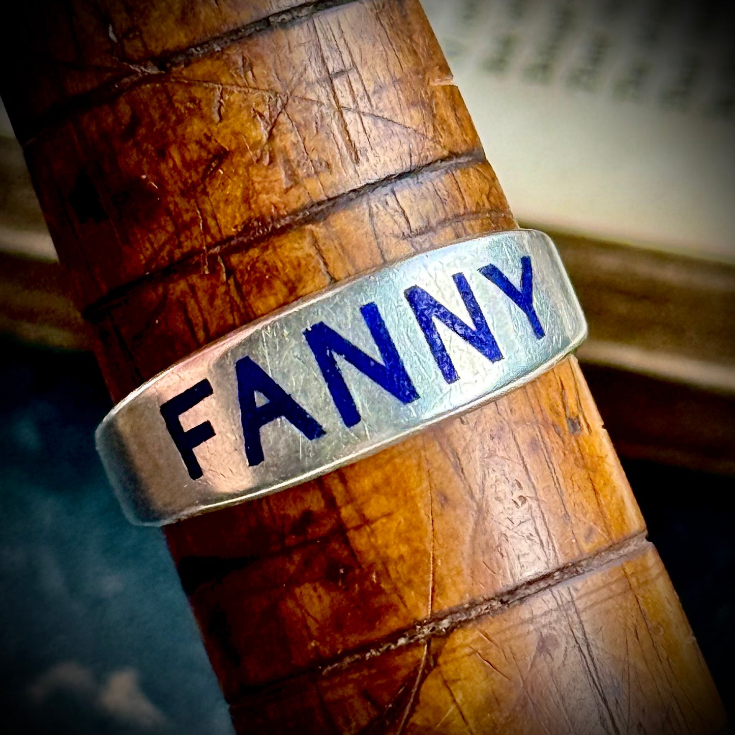 Victorian 'Fanny' Enamel Ring In Silver; Circa 1879