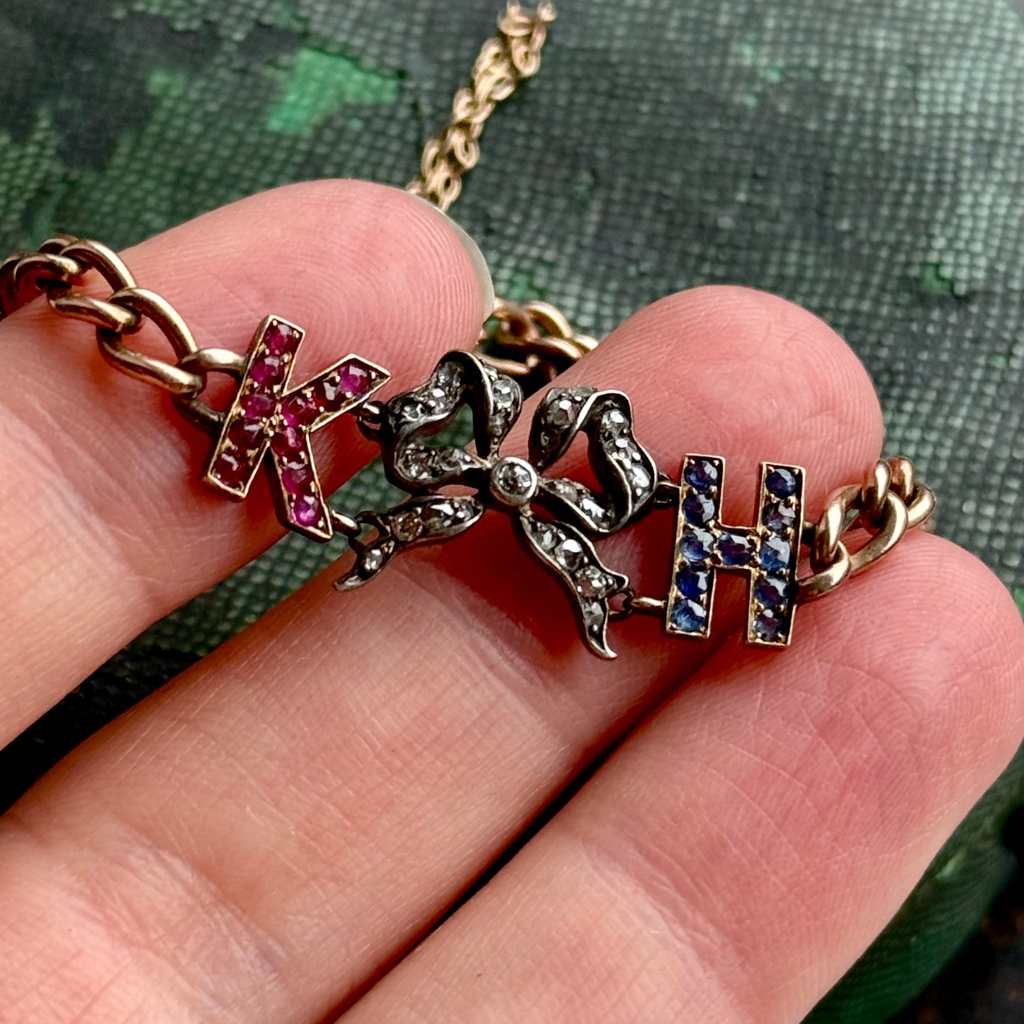 Antique 'K H' Diamond, Ruby & Sapphire Bracelet in 9 Carat Gold